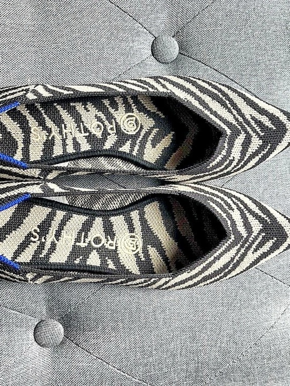Rothy’s pointed toe zebra print flats
